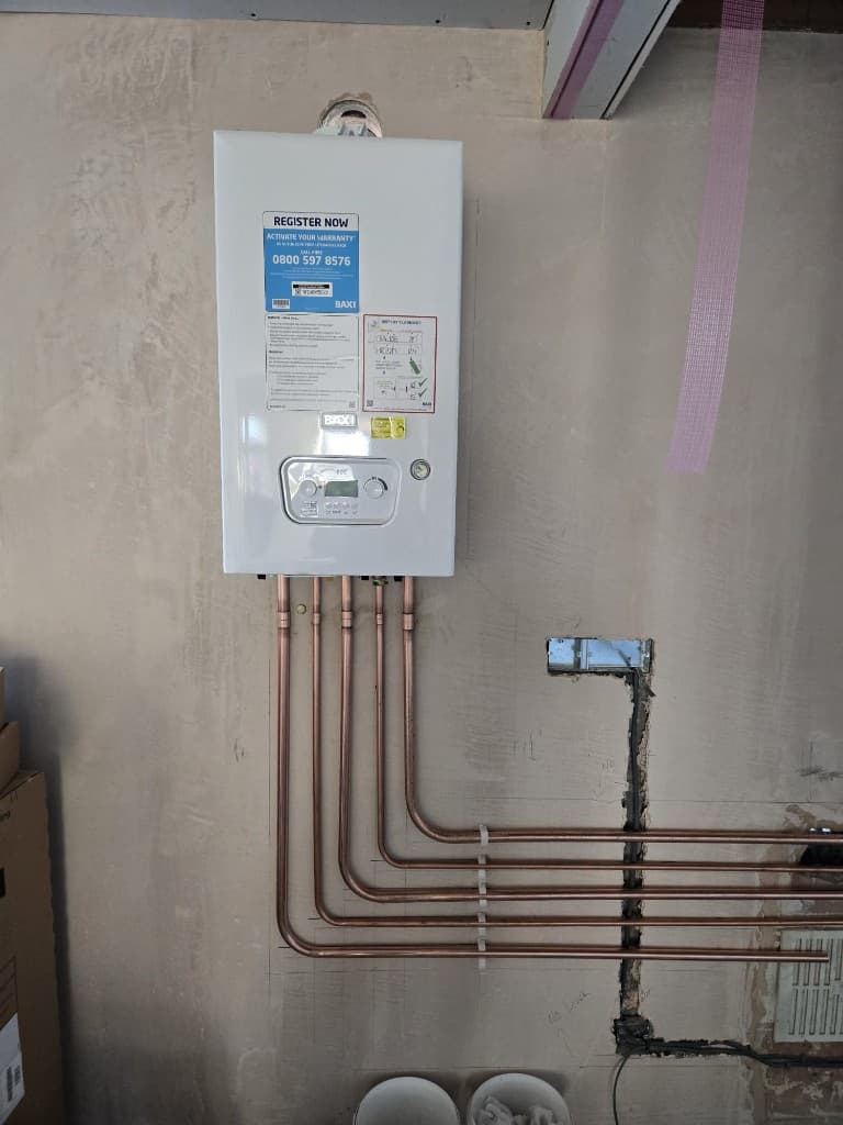 Baxi boiler installation with neat copper pipework in Paignton
