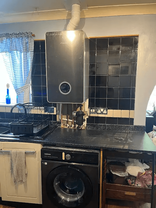 Black Worcester boiler installation in a domestic kitchen