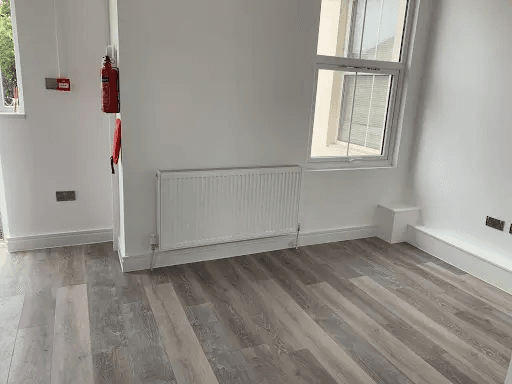 Domestic radiator installation in a finished room in Torbay